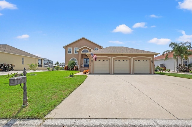 view of front of property featuring a garage and a front yard