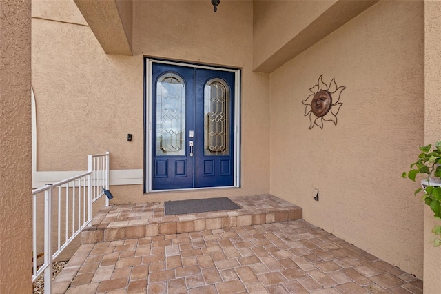 doorway to property featuring a porch