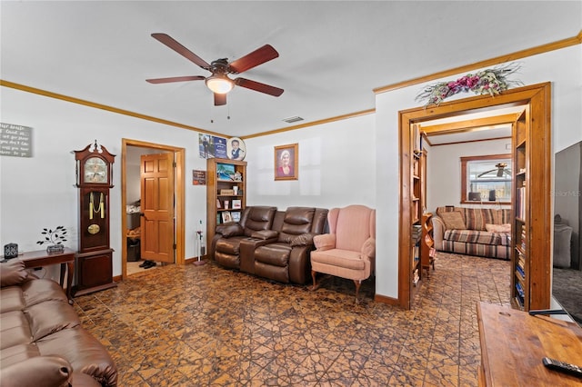 living room with ceiling fan and ornamental molding