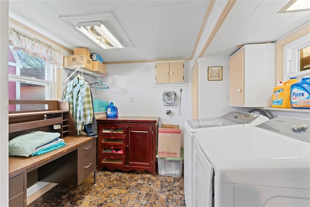 washroom with cabinets and separate washer and dryer