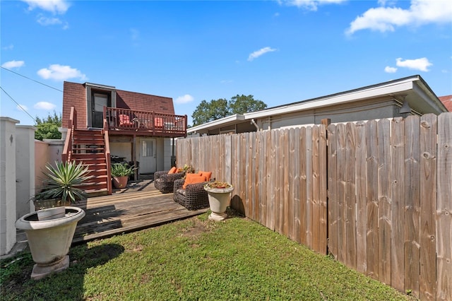 view of yard featuring a deck