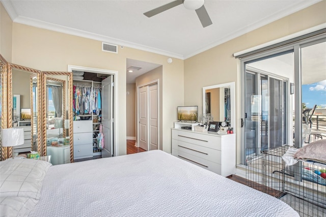 bedroom featuring access to outside, ceiling fan, crown molding, and dark hardwood / wood-style floors