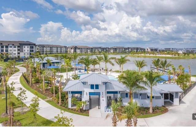 birds eye view of property featuring a water view