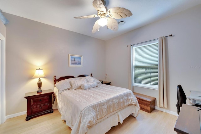 bedroom featuring ceiling fan and light hardwood / wood-style floors