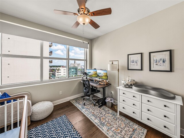 office with ceiling fan and dark hardwood / wood-style floors