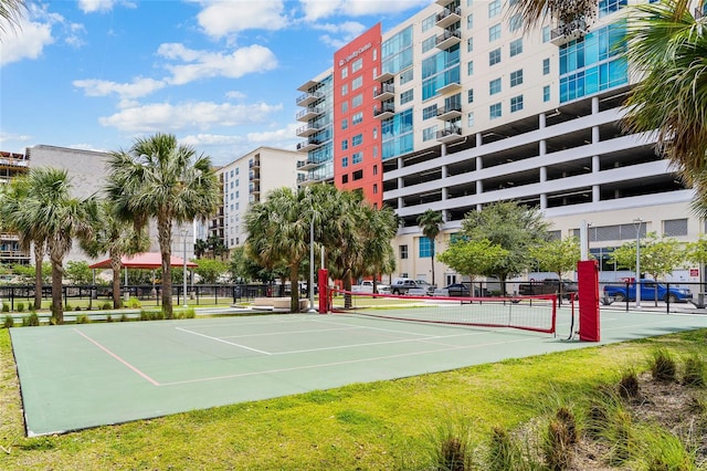 surrounding community featuring tennis court