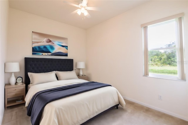 bedroom featuring ceiling fan and carpet floors