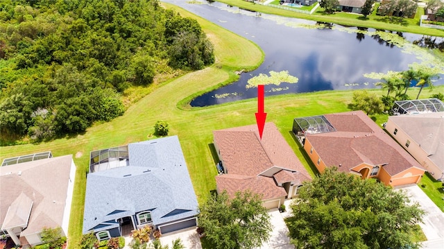 birds eye view of property featuring a water view