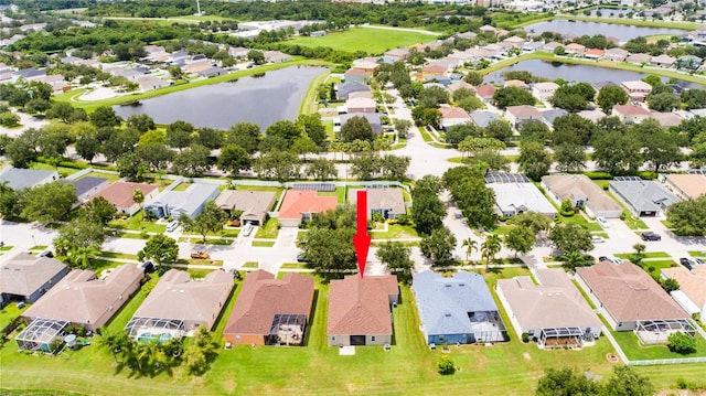 bird's eye view with a water view