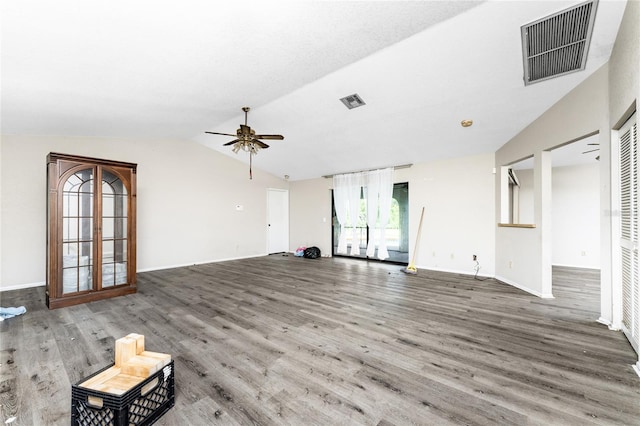 unfurnished living room with ceiling fan, lofted ceiling, and hardwood / wood-style flooring