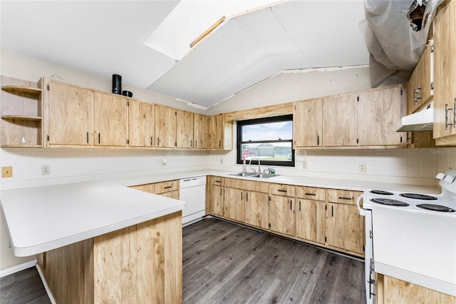 kitchen featuring white appliances, dark hardwood / wood-style flooring, sink, lofted ceiling with skylight, and kitchen peninsula