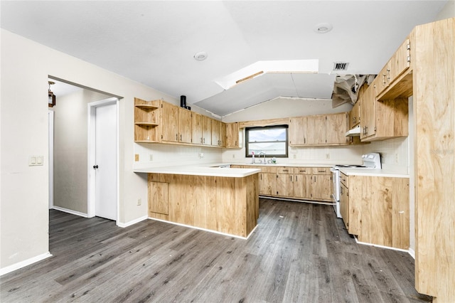 kitchen featuring white range with electric cooktop, wood-type flooring, lofted ceiling, and kitchen peninsula