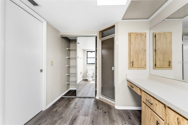 interior space featuring hardwood / wood-style floors and a closet