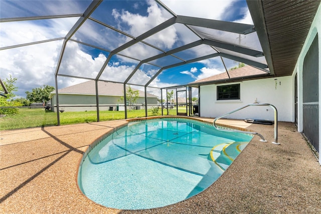 view of swimming pool featuring a lanai and a patio