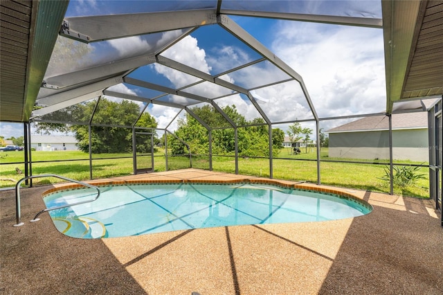 view of swimming pool with a lanai and a lawn