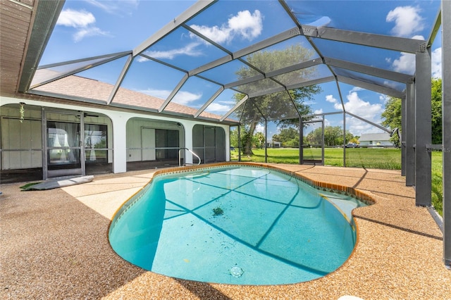 view of pool featuring a lanai