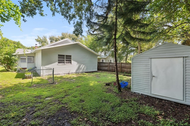 view of yard with a shed