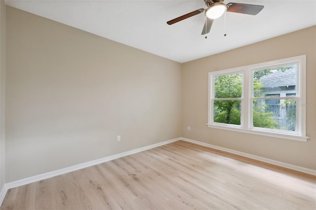 unfurnished room featuring ceiling fan and light hardwood / wood-style flooring