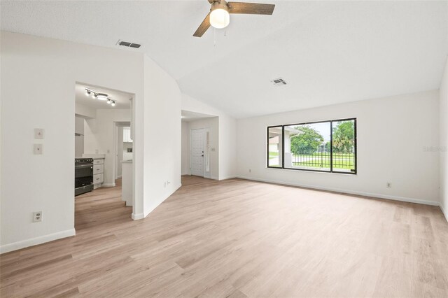 unfurnished living room featuring ceiling fan, light wood-type flooring, and lofted ceiling