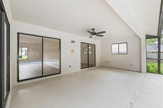 interior space featuring ceiling fan