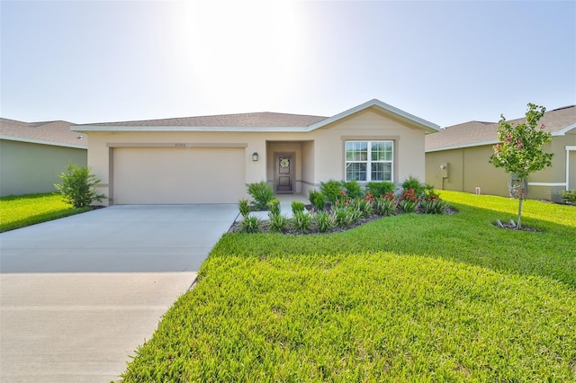 ranch-style home featuring a front lawn and a garage