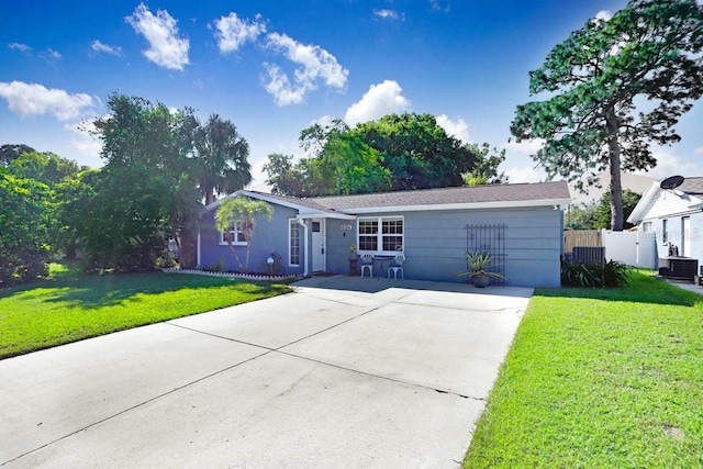 ranch-style house featuring a front lawn