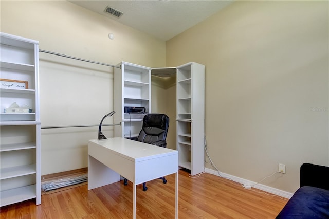 office area featuring light hardwood / wood-style flooring