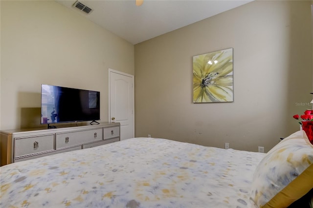 bedroom featuring lofted ceiling