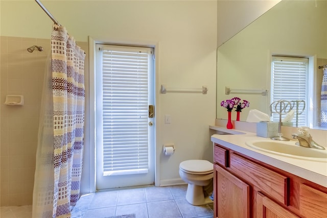 25954 Risen Star Dr, Wesley Chapel, FL 33544 - bathroom with vanity, toilet, tile patterned floors, and a shower with shower curtain