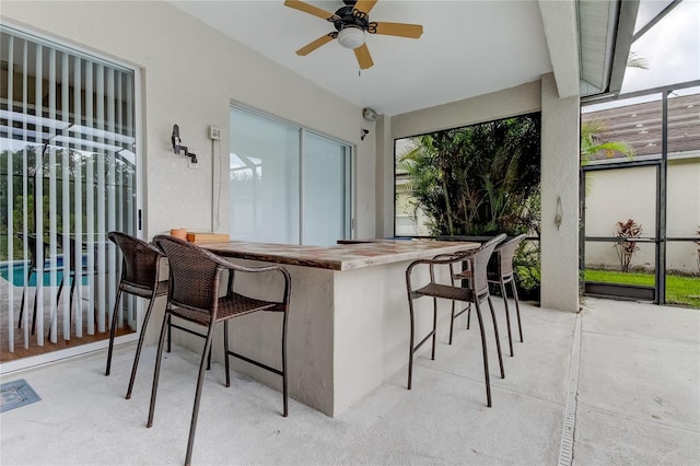 25954 Risen Star Dr, Wesley Chapel, FL 33544 - view of patio featuring an outdoor bar and ceiling fan