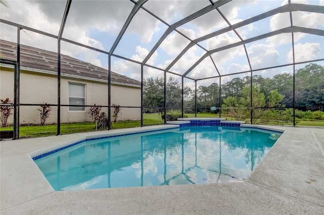 view of pool featuring a lanai