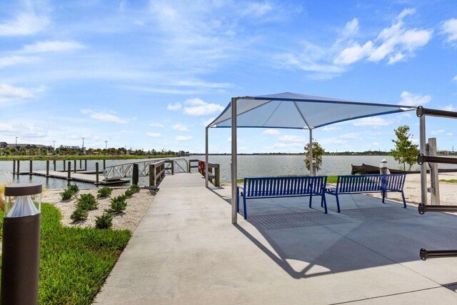 dock area featuring a water view