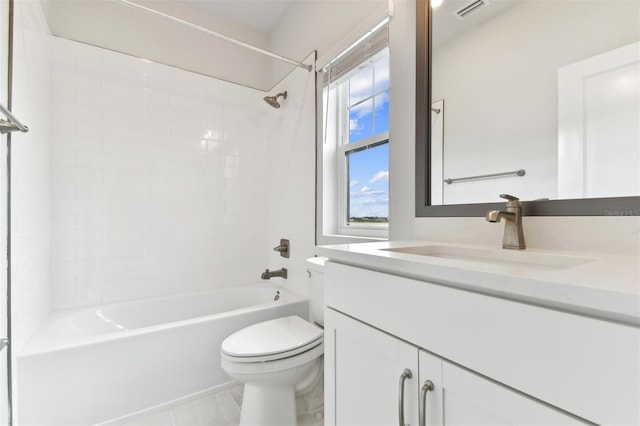 full bathroom with tile patterned floors, vanity, toilet, and tub / shower combination