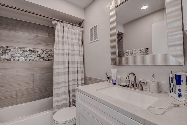 full bathroom featuring vanity, shower / bathtub combination with curtain, and toilet