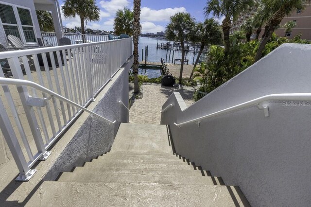 stairway featuring a water view