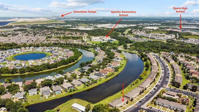 birds eye view of property with a water view