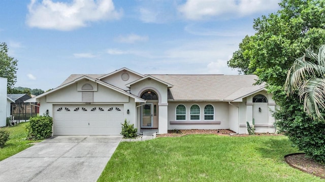 ranch-style house with a garage and a front yard