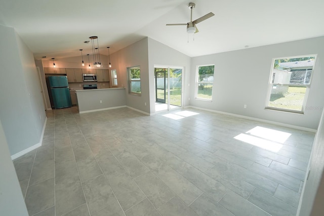 unfurnished living room with high vaulted ceiling, ceiling fan, and baseboards