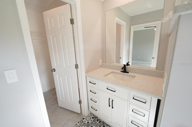 bathroom with vanity and tile patterned floors