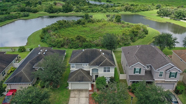 drone / aerial view featuring a water view