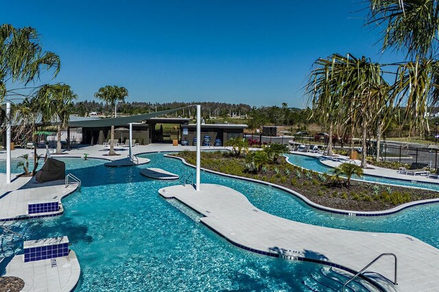 view of pool with a patio area