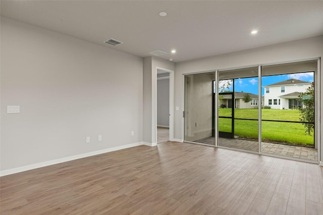 empty room featuring light hardwood / wood-style flooring