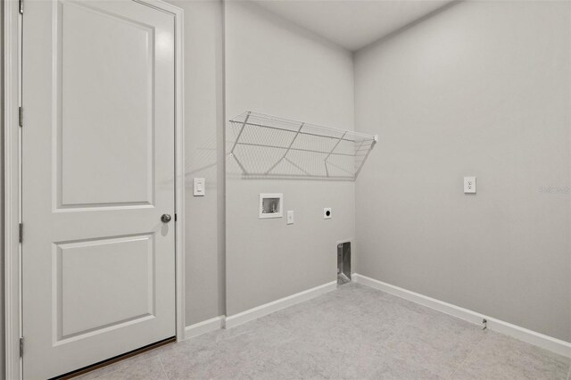 laundry area with washer hookup and electric dryer hookup