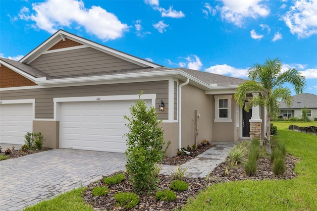 view of front of home with a garage