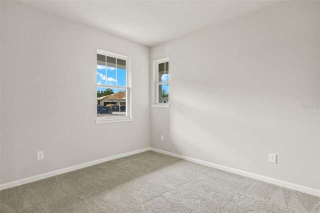 view of carpeted spare room