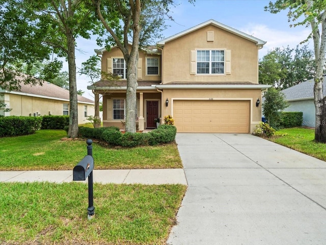 view of front facade featuring a garage and a front yard