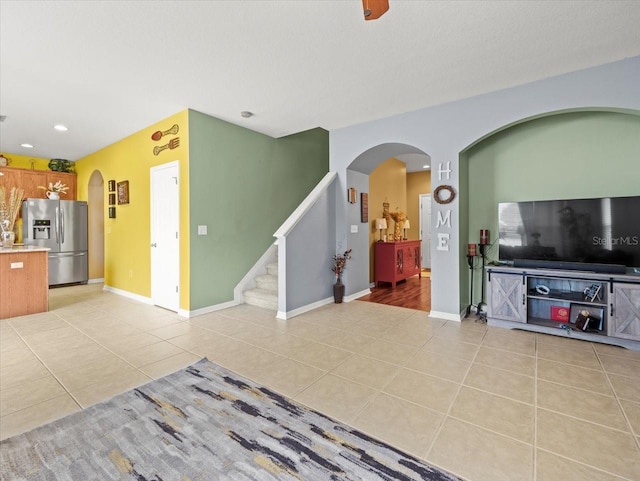 living room with light tile patterned floors