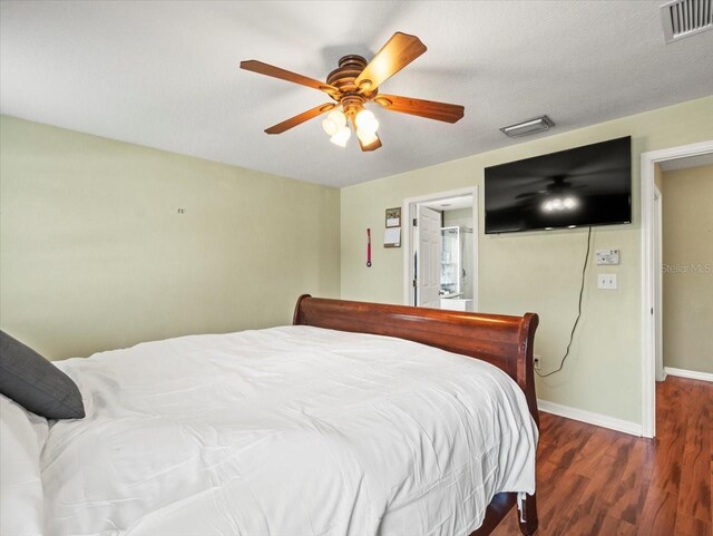 bedroom featuring hardwood / wood-style floors and ceiling fan