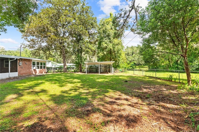 view of yard with a fenced backyard