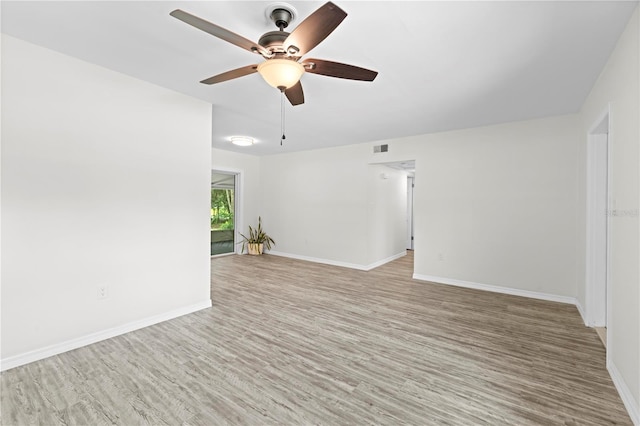 unfurnished room featuring ceiling fan and light hardwood / wood-style flooring